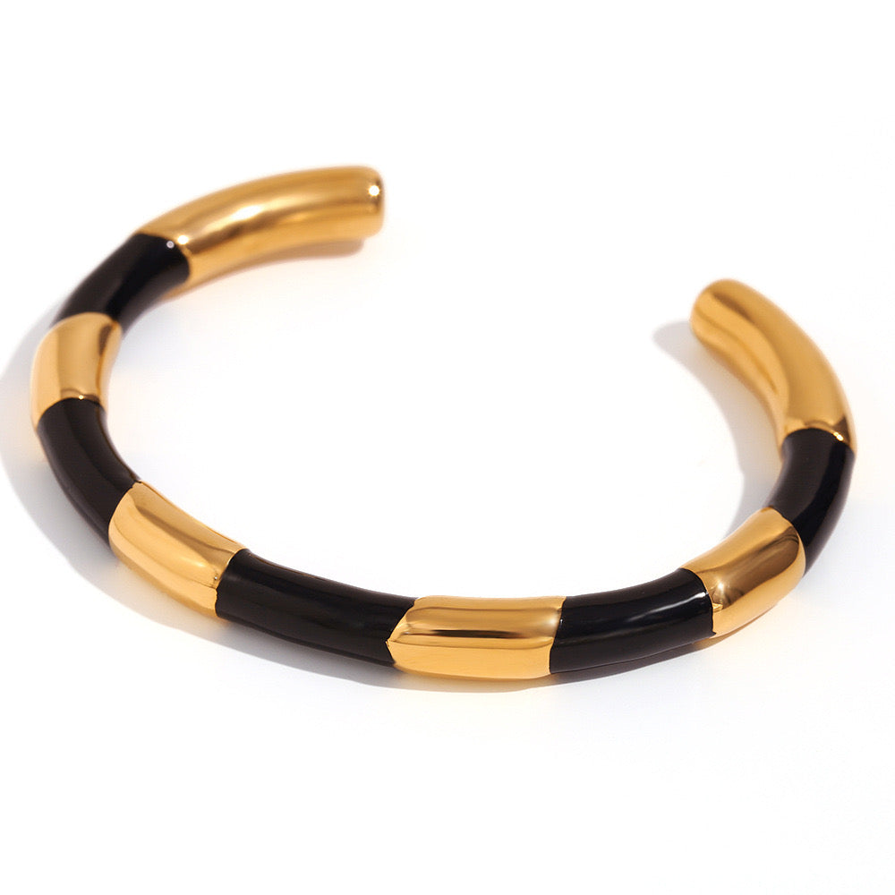 Close View of Gold bangle with enamel accents and segmented design – waterproof and elegant – STUD