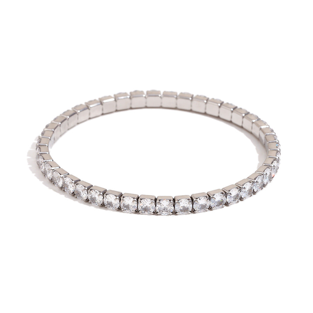 18K gold plated stretch bracelet with round-cut zircon stones – STUD