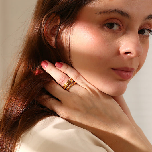 18K gold plated layered statement ring with 4 interlocked bands and zircon detailing – STUD