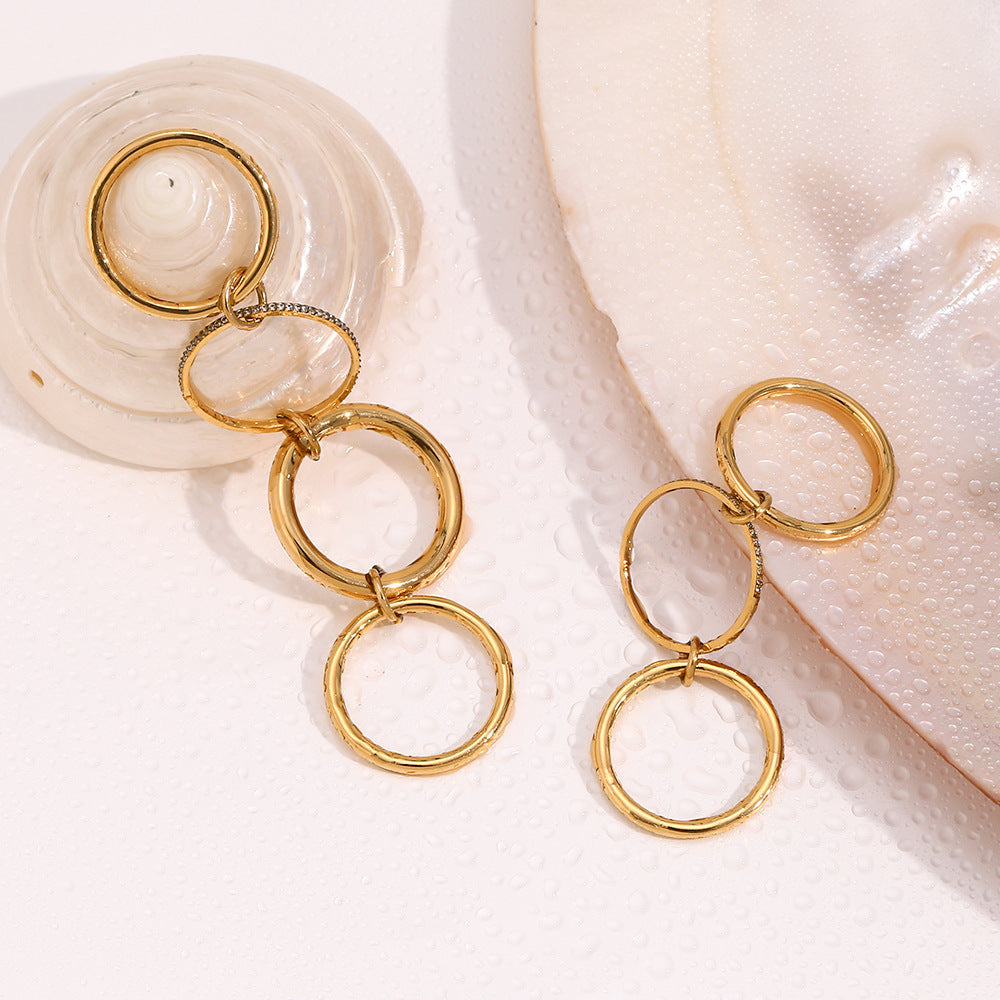 18K gold plated layered statement ring with 4 interlocked bands and zircon detailing – STUD