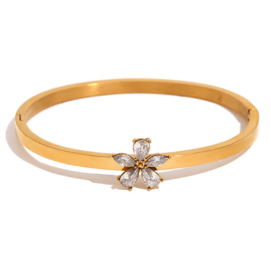 Close View of Elegant 18K gold-plated floral bangle with white zircon stones – waterproof and hypoallergenic luxury bracelet by STUD