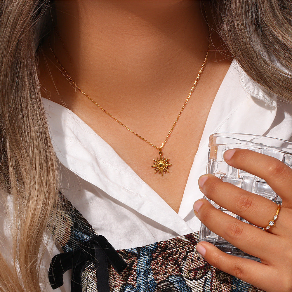 Model Wearing Titanium steel sun, moon & star pendant necklace – celestial design by STUD-Shop Till You Drop