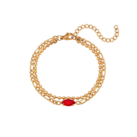 Close View of Double-layer bracelet with Figaro and beaded chain featuring a red zircon charm – 18K gold-plated, water-resistant and hypoallergenic