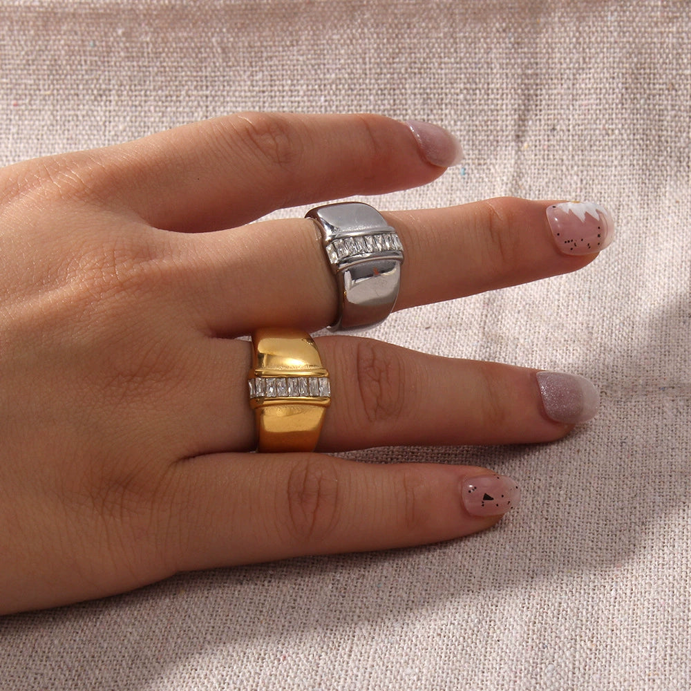 Gold Ring With A Diamond Set In The Center