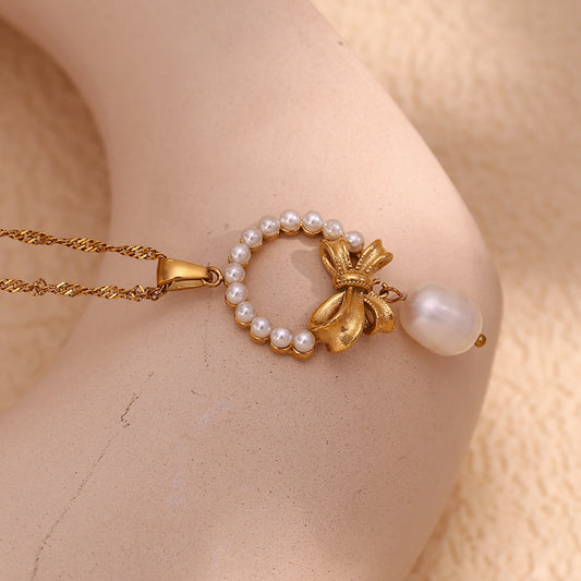 18K gold plated pearl bow charm necklace with faux pearls and drop pendant – STUD