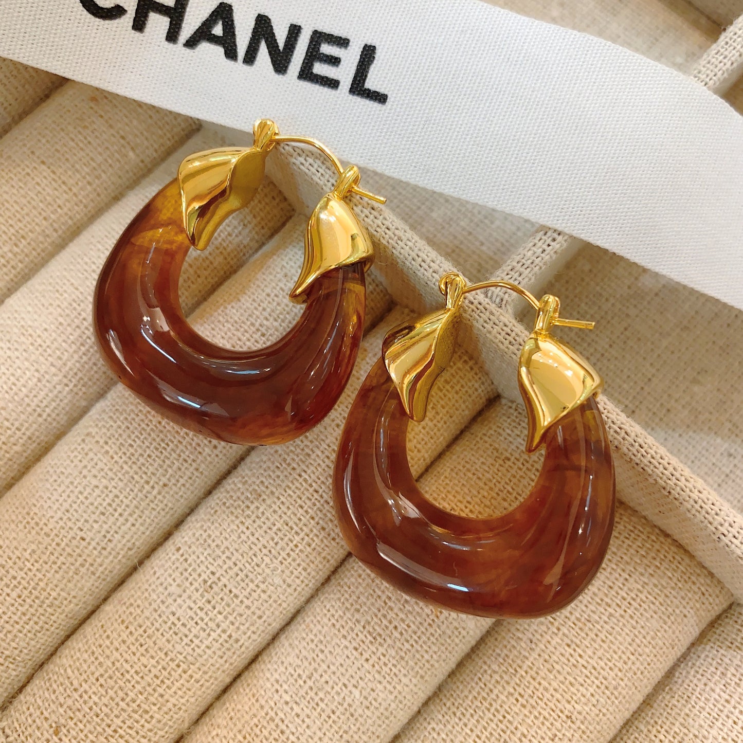 Close View of Amber U-shaped hoop earrings – geometric retro design, hypoallergenic, bold style by STUD (Shop Till You Drop)