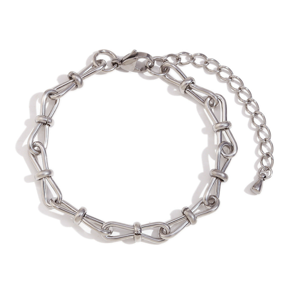 Elegant handcrafted stainless steel bowknot bracelet in silver with minimalist design – waterproof and hypoallergenic