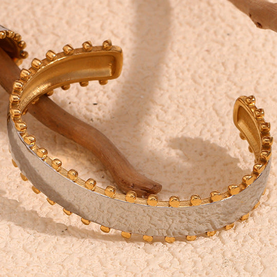 Close View of Sleek 18K gold-plated beaded edge bangle bracelet for women – waterproof, tarnish-free, and minimalist luxury by STUD