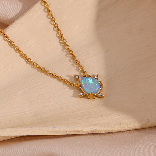 Close View of Gold necklace with waterdrop-shaped blue opal pendant – vintage, hypoallergenic by STUD (Shop Till You Drop)