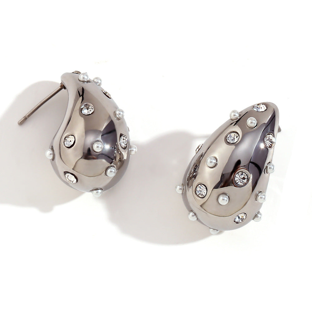 Close View of Silver hollow teardrop earrings with pearls – waterproof, hypoallergenic, geometric by STUD (Shop Till You Drop)