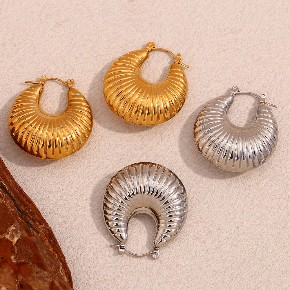 Top View of twisted ram’s horn earrings – stainless steel, waterproof, anti-tarnish by STUD (Shop Till You Drop)