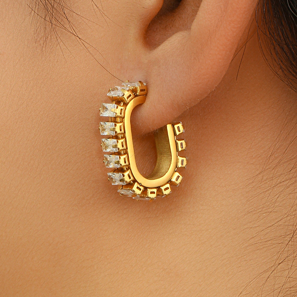 Model Wearing O-shaped geometric stud earrings with zircon – 18K gold-plated, waterproof, hypoallergenic by STUD (Shop Till You Drop)