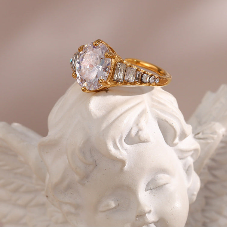 close up view of Luxe oval zircon ring – adjustable 18K gold-plated stainless steel with clear gemstone – minimalist Gen Z jewelry by STUD (Shop Till You Drop)