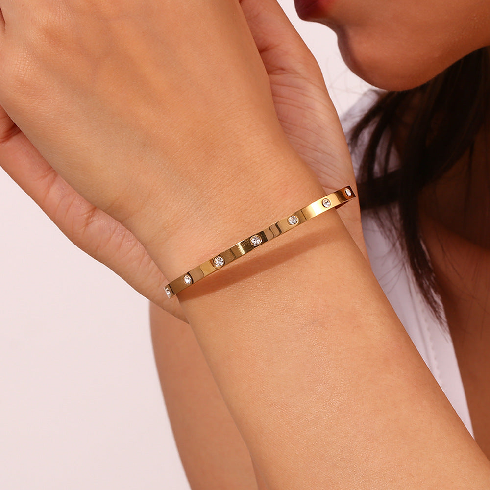 18K gold plated bangle bracelet with round zircon stones and clasp lock – STUD
