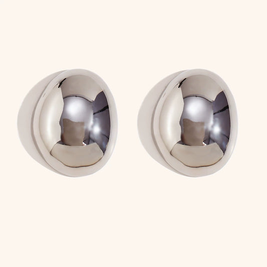 Close View of Silver hollow teardrop bead earrings – 3D design, polished stainless steel, hypoallergenic by STUD (Shop Till You Drop)