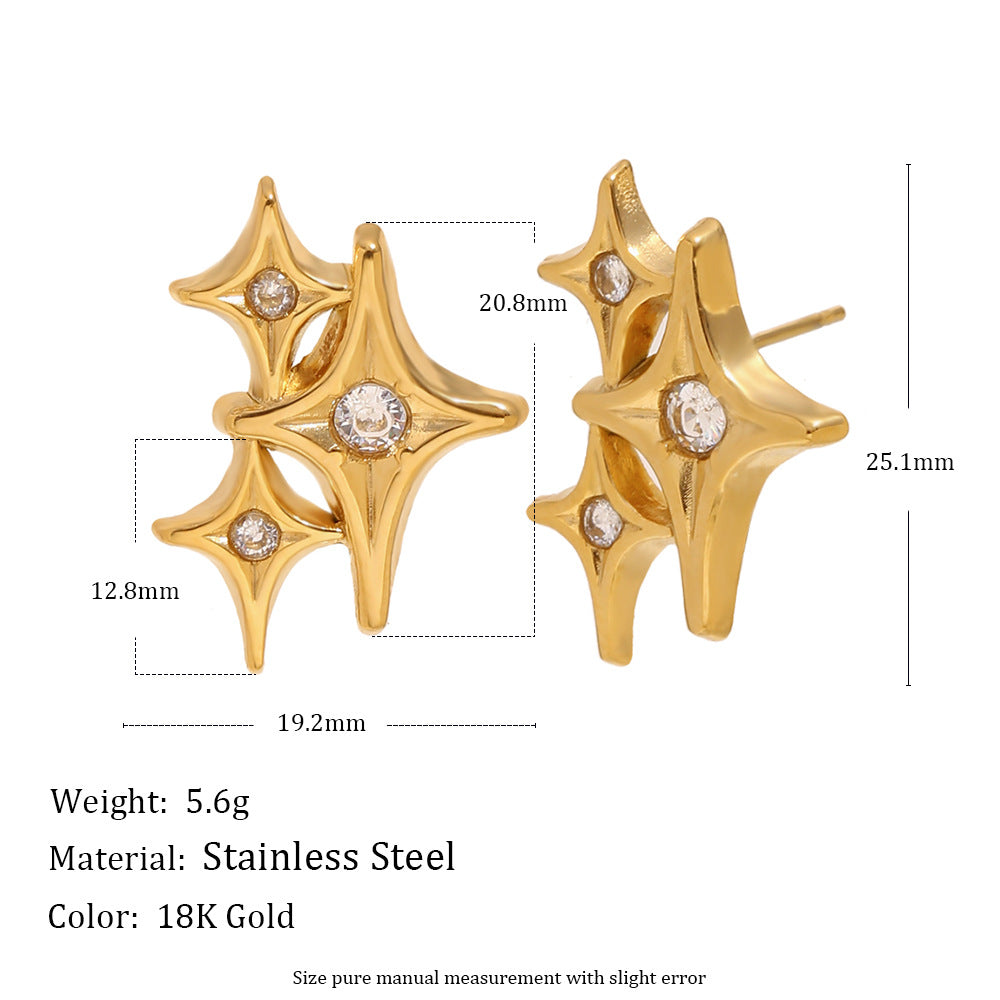 STUD gold starburst earrings with zircon stones, geometric celestial studs