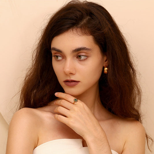 Model wearing Emerald zircon ruffled ring – 18K gold-plated stainless steel with vintage-inspired full zircon design – statement jewelry by STUD (Shop Till You Drop)