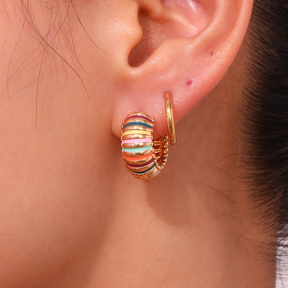 Model Wearing Vintage 19mm enamel hoop earrings – colorful, 18K gold-plated, waterproof by STUD (Shop Till You Drop)