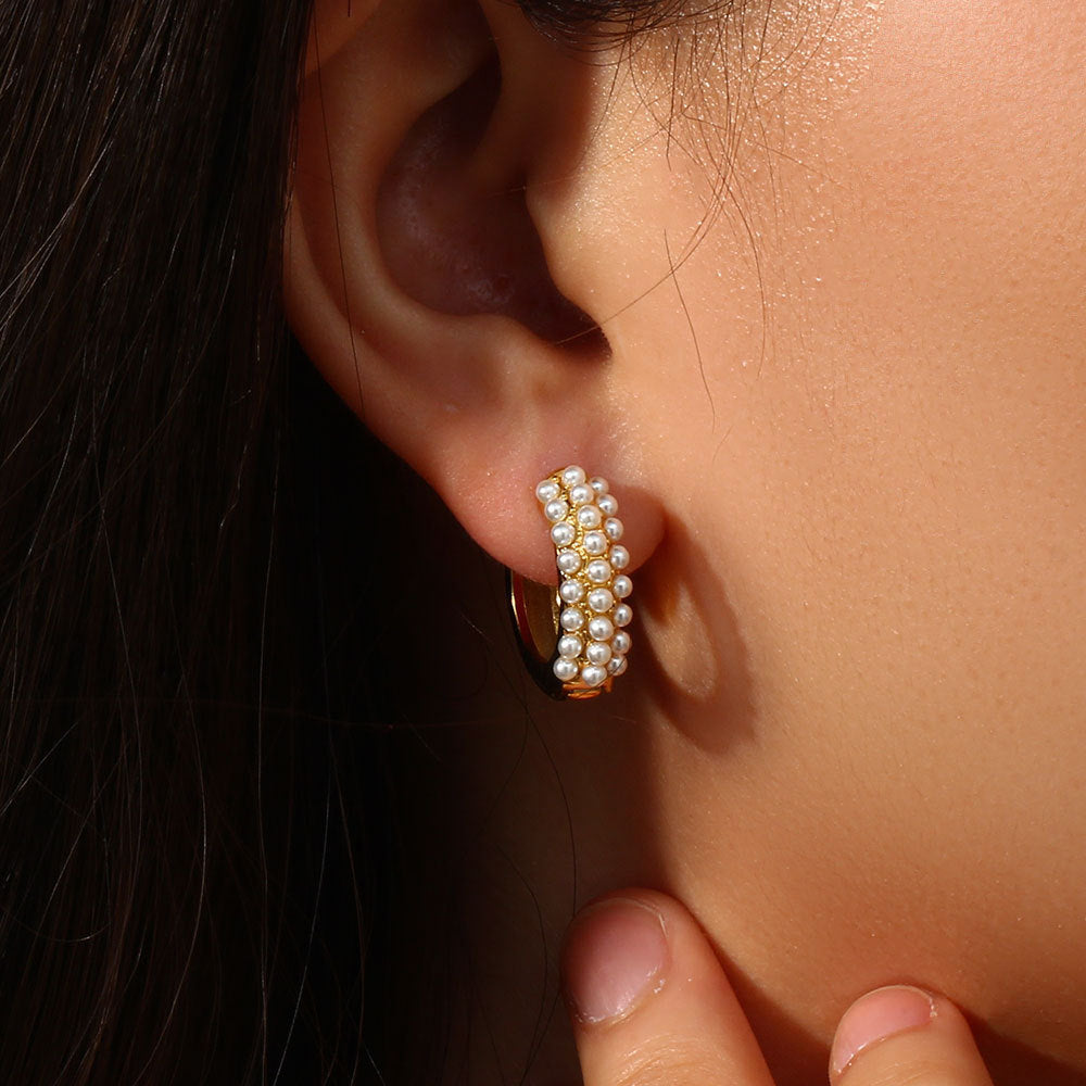 Model Wearing Baroque pearl hoop earrings – minimalist 18K gold-plated, waterproof, hypoallergenic by STUD (Shop Till You Drop)