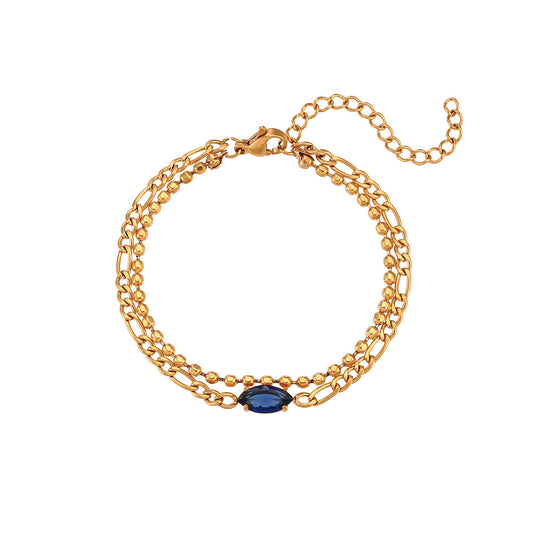 Close View of Double-layer bracelet with Figaro chain, beaded design, and blue zircon charm – 18K gold-plated, waterproof and hypoallergenic