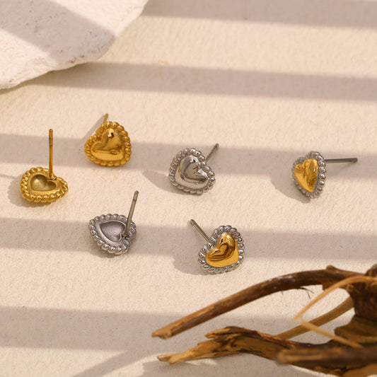 Top view of Two-tone twisted heart stud earrings – 18K gold-plated, waterproof, anti-tarnish jewelry by STUD (Shop Till You Drop)