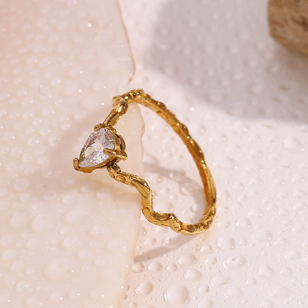 18K gold plated wave band ring with teardrop zircon stone – STUD