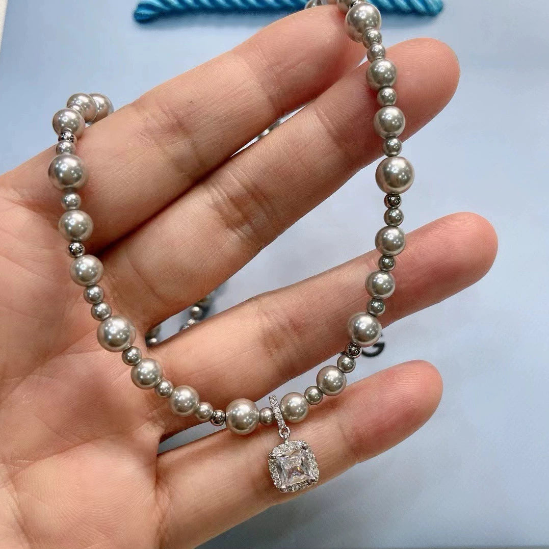 Silver pearl and diamond necklace – electroplated geometric design by STUD-Shop Till You Drop