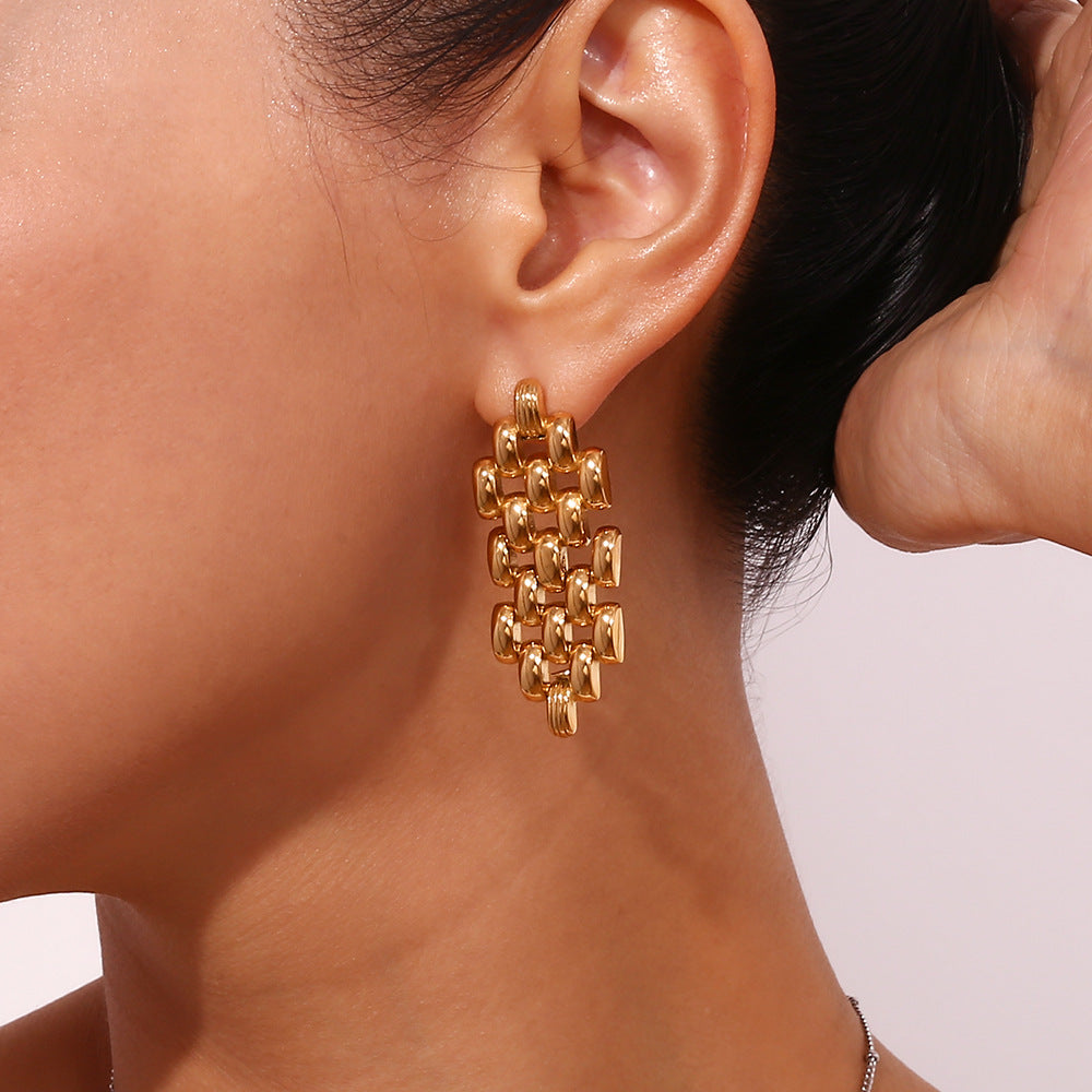 Model Wearing Handwoven Boho chain earrings – diamond-shaped 18K gold-plated, waterproof by STUD (Shop Till You Drop)