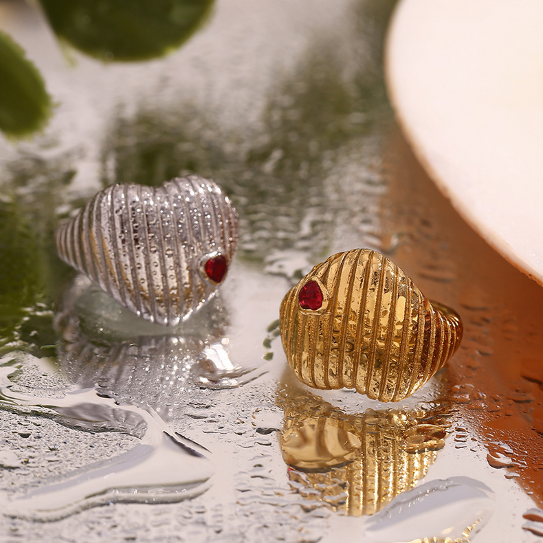 Golden Heart Ring with Ruby Accent