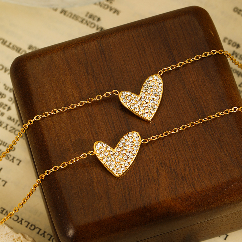Close View of Heart of gold bracelet with zirconia inlay – gold plated stainless steel by STUD-Shop Till You Drop