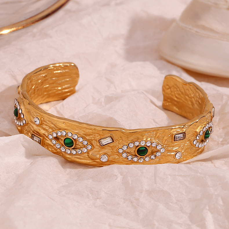 Close View of Gold evil eye bracelet with zirconia stones – symbolic jewelry – STUD