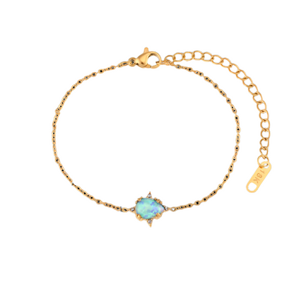Close View of Gold bracelet with blue waterdrop opal charm – vintage design, hypoallergenic by STUD (Shop Till You Drop)