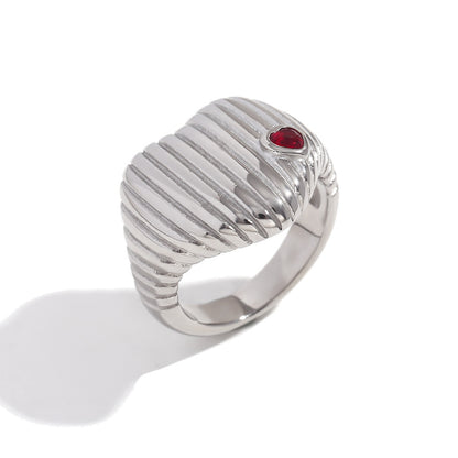 Close up View of Silver heart ring with ruby accent – ribbed waterproof hypoallergenic jewelry by STUD (Shop Till You Drop)