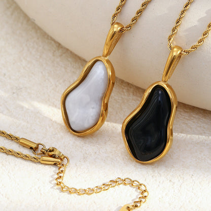 STUD Onyx Flow Necklace – Black Baroque Pendant on Gold Rope Chain