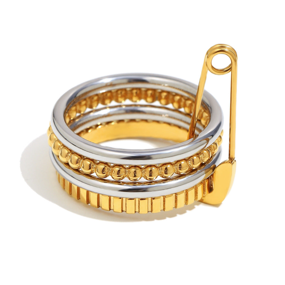 4-layer gold and silver ring with safety pin design, beaded and textured bands