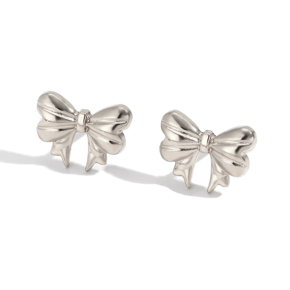 Silver bow stud earrings - Dainty 18K plated silver hypoallergenic earrings by STUD