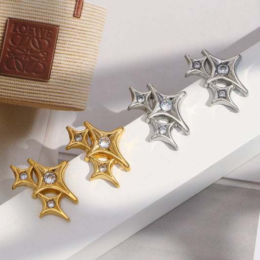 STUD gold starburst earrings with zircon stones, geometric celestial studs