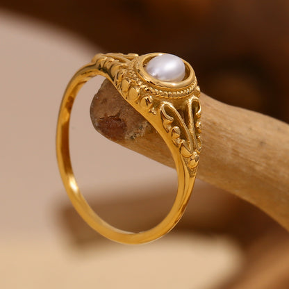 Delicate, feminine, and timeless — this Gold Plated Pearl Flower Ring is designed to elevate any look with understated charm. Featuring a dainty floral motif paired with fine pearls, it captures the essence of modern minimalism and vintage elegance. Made from stainless steel and finished in radiant gold plating, it's waterproof and anti-tarnish — perfect for daily wear without compromising shine or style.