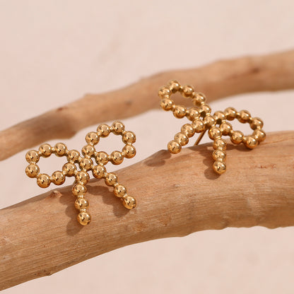 Top View of Gold bow knot earrings with round bead – 18K gold-plated, waterproof, hypoallergenic by STUD (Shop Till You Drop)