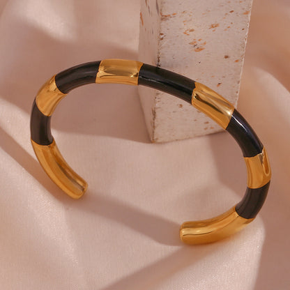 Gold bangle with enamel accents and segmented design – waterproof and elegant – STUD