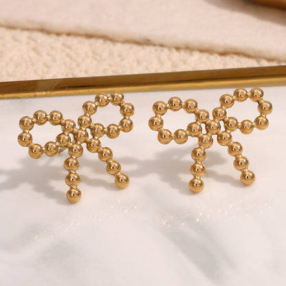 Gold bow knot earrings with round bead – 18K gold-plated, waterproof, hypoallergenic by STUD (Shop Till You Drop)