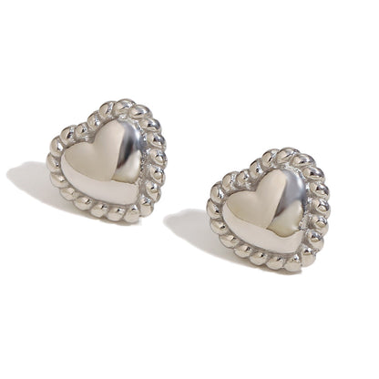Front view of Silver twisted heart stud earrings – stainless steel, waterproof, anti-tarnish jewelry by STUD (Shop Till You Drop)