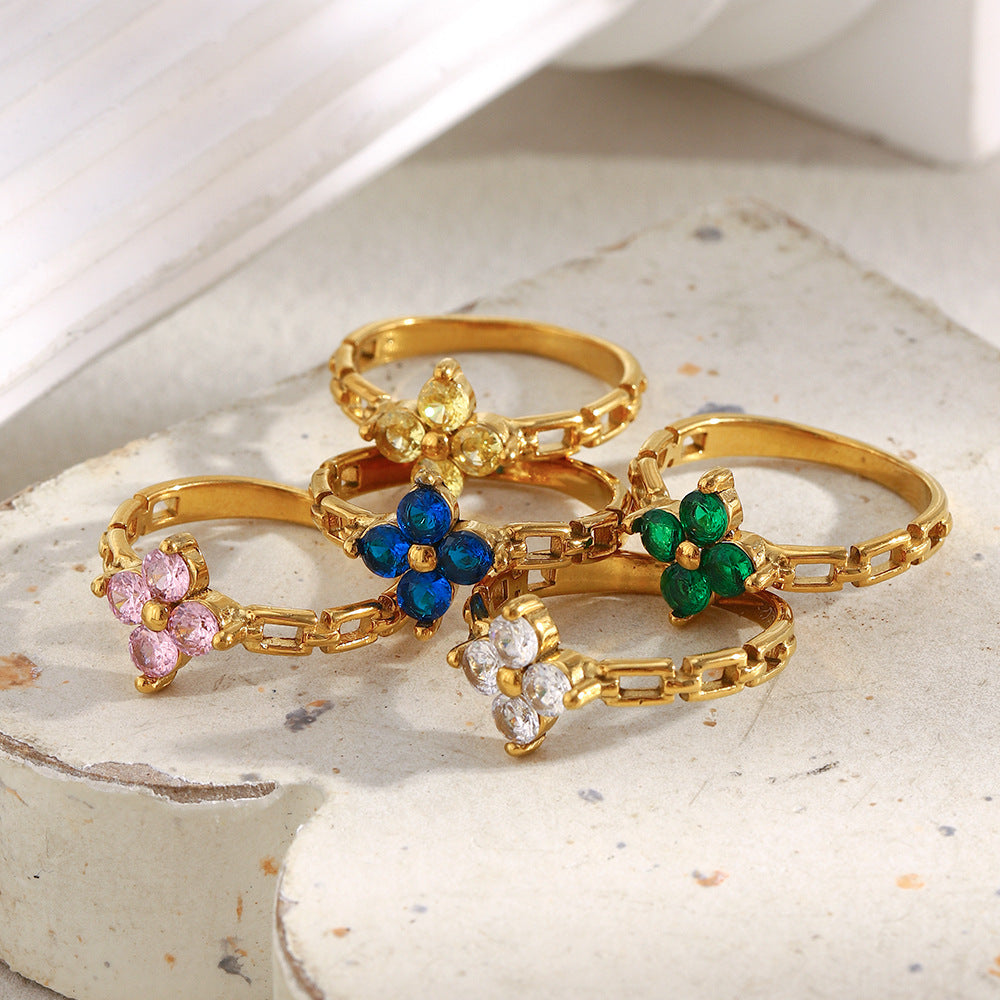 Gold-plated chain band ring with blue zircon flower center – STUD