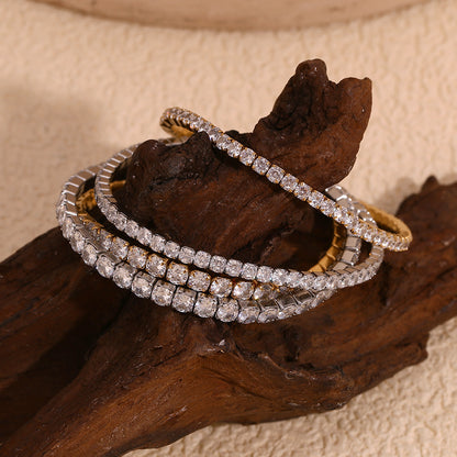 18K gold plated stretch bracelet with round-cut zircon stones – STUD