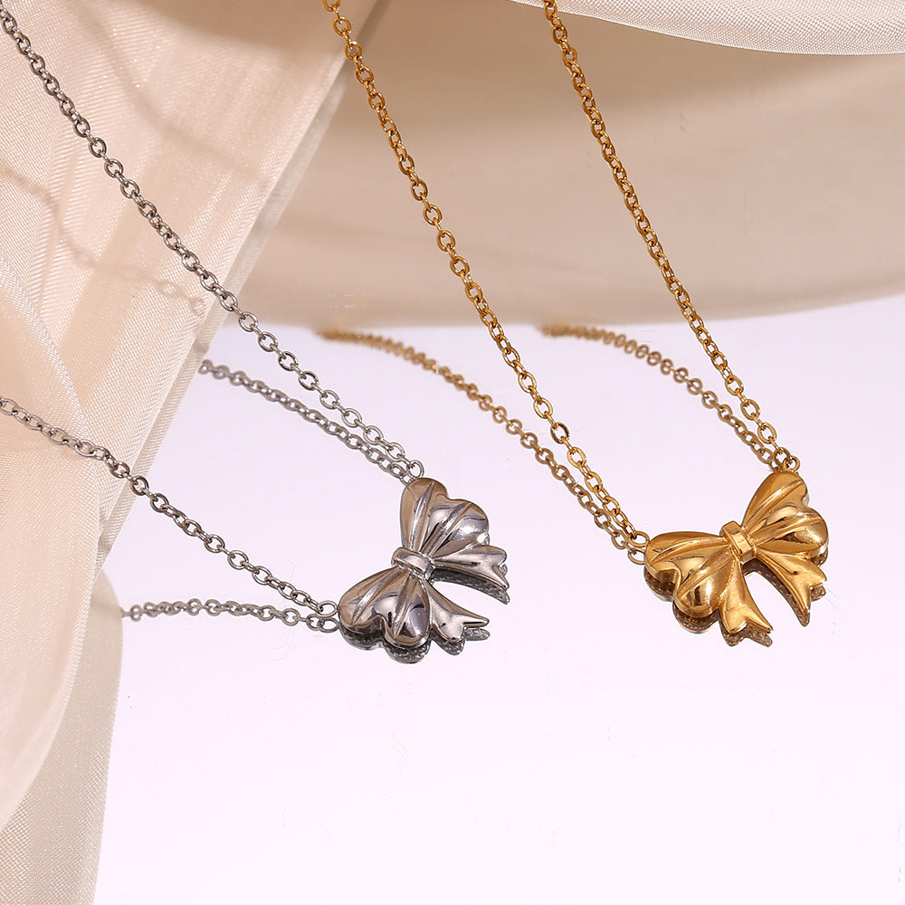Gold bow pendant necklace - 18K gold plated, waterproof and hypoallergenic by STUD