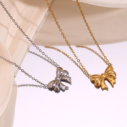 Gold bow pendant necklace - 18K gold plated, waterproof and hypoallergenic by STUD