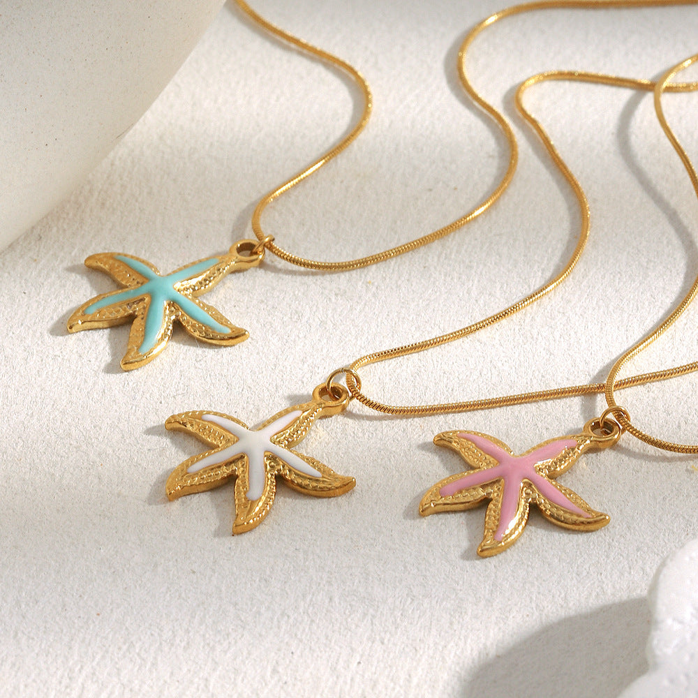 White enamel gold starfish pendant necklace with 18K gold chain