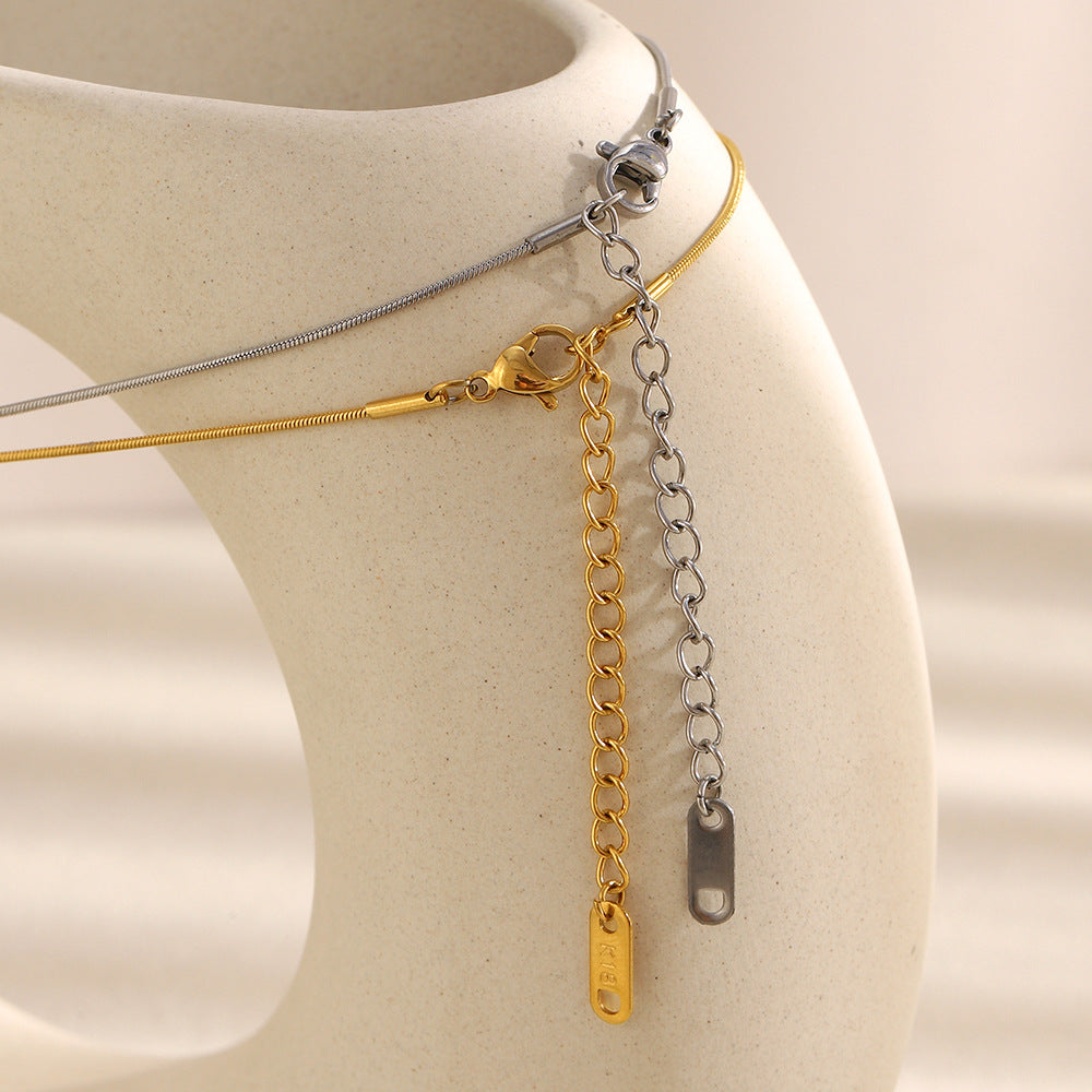 Gold 18K plated star pendant necklace with zircon crystal accents on snake chain – STUD