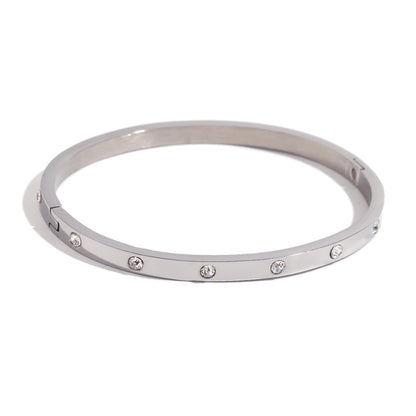Silver stainless steel zircon bangle with round stones and snap-lock clasp – STUD