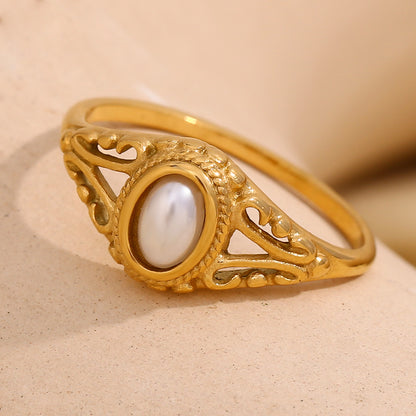 Delicate, feminine, and timeless — this Gold Plated Pearl Flower Ring is designed to elevate any look with understated charm. Featuring a dainty floral motif paired with fine pearls, it captures the essence of modern minimalism and vintage elegance. Made from stainless steel and finished in radiant gold plating, it's waterproof and anti-tarnish — perfect for daily wear without compromising shine or style.